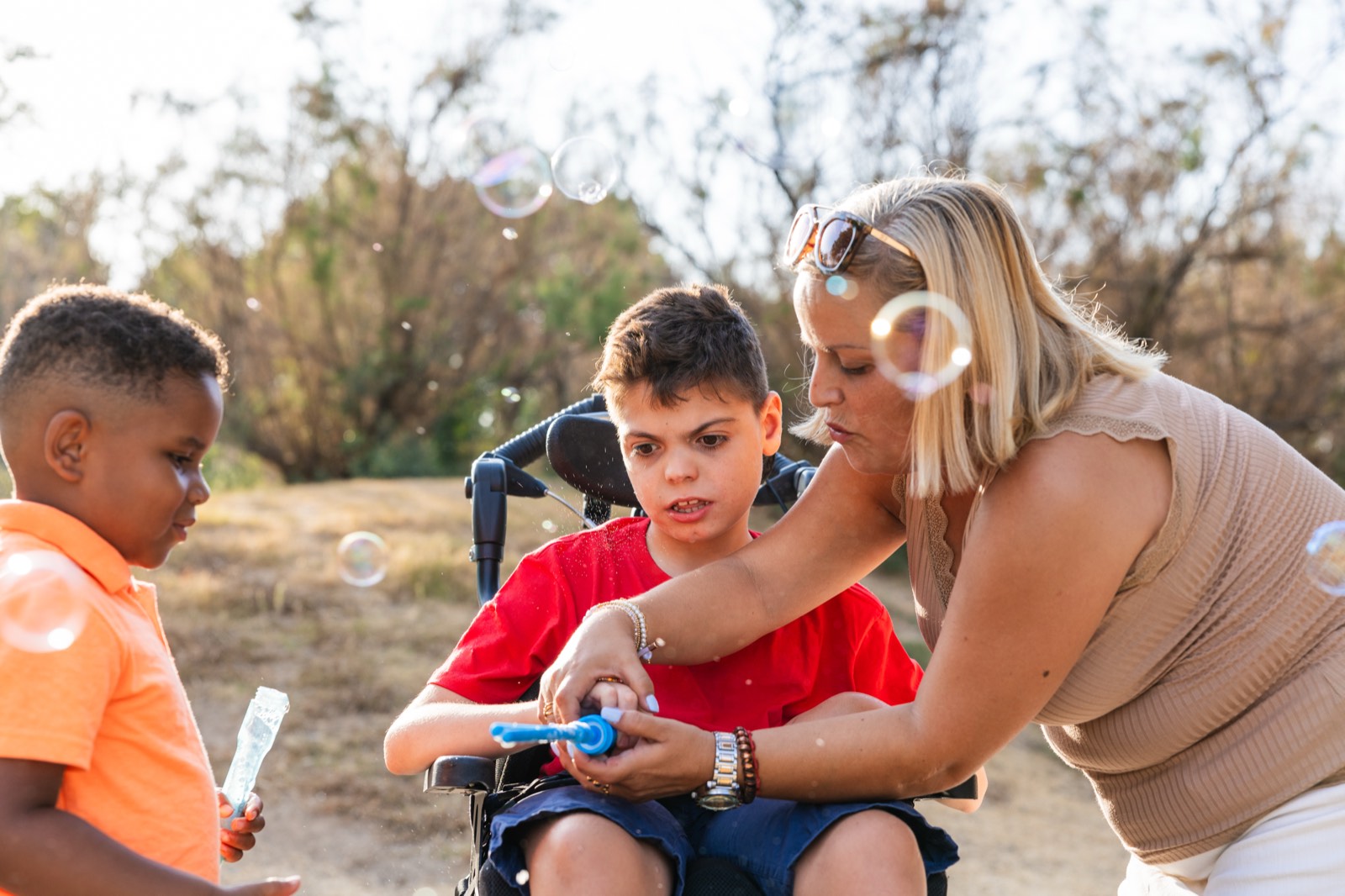 A parent and two children relaxing together at home